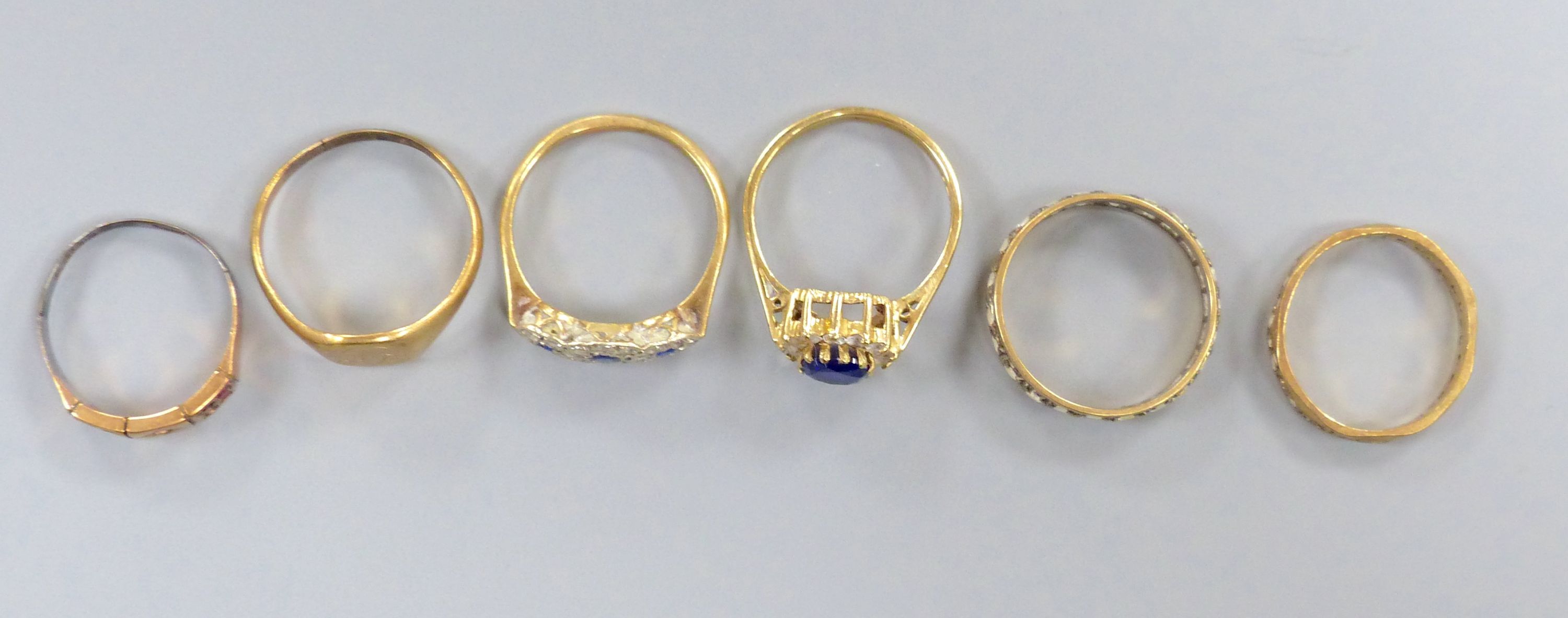 Six 9ct gold rings, variously gem or paste-set, gross 13.7 grams.